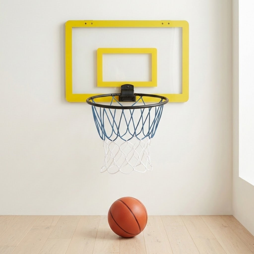 A wall-mounted basketball hoop with a bright yellow backboard frame, black rim, blue net, and white net, shown on a light wall above a wood floor with a basketball on the floor.