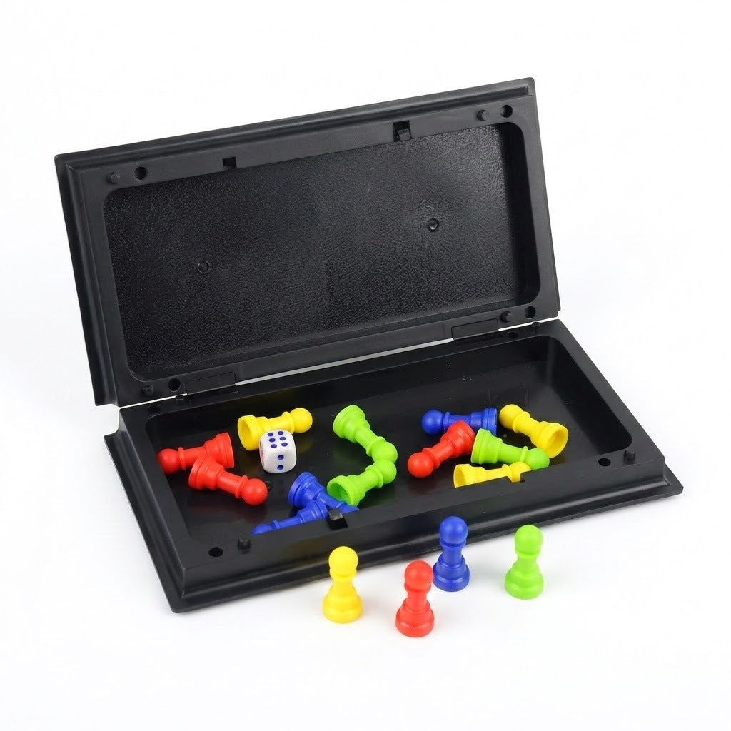 An open black plastic ludo set displays colourful pawns and a white die, with four pawns standing in front against a white background.