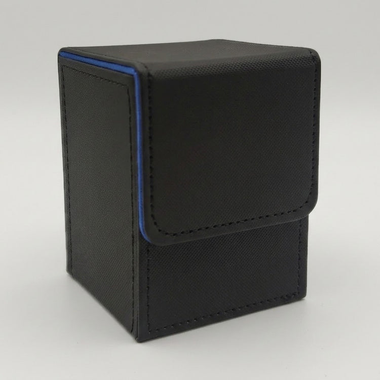 Black leather deck box with a fold-over flap and blue trim along the edge, photographed on a plain light gray background.