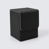 A closed black textured deck box with gray trim and a stitched front flap stands against a light gray background.