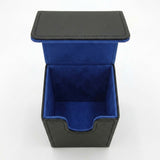 Empty open black deck box with blue lining and a U-shaped front cutout, viewed from above against a white background.