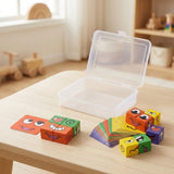 Expression matching game with colorful cubes, reference cards and an open clear storage case on a light wood table.