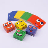 Face matching game with red, yellow, green, and purple expression blocks arranged before fanned face cards on a pale background.