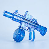 A translucent blue electric water gun with a round reservoir and top sight is displayed against a pale blue background.