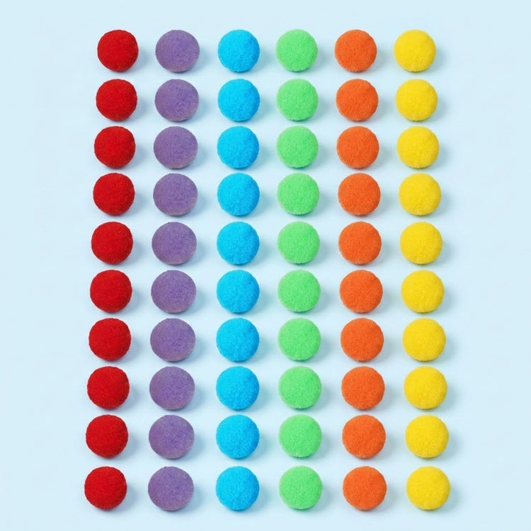 Sixty rainbow pom poms for a sorting toy arranged in a six by ten grid on a light blue background.