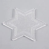 Clear six-pointed star plastic pegboard with rows of small pegs and an inner star outline on a light grey background.