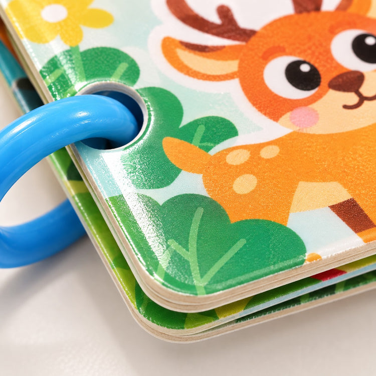 Preschool Sticker Matching Busy Book close-up shows its smooth laminated page, layered edge, and blue ring.