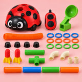 Ladybug Activity Toy Set 3-in-1 accessories and ladybug base are arranged on a pale red backdrop.