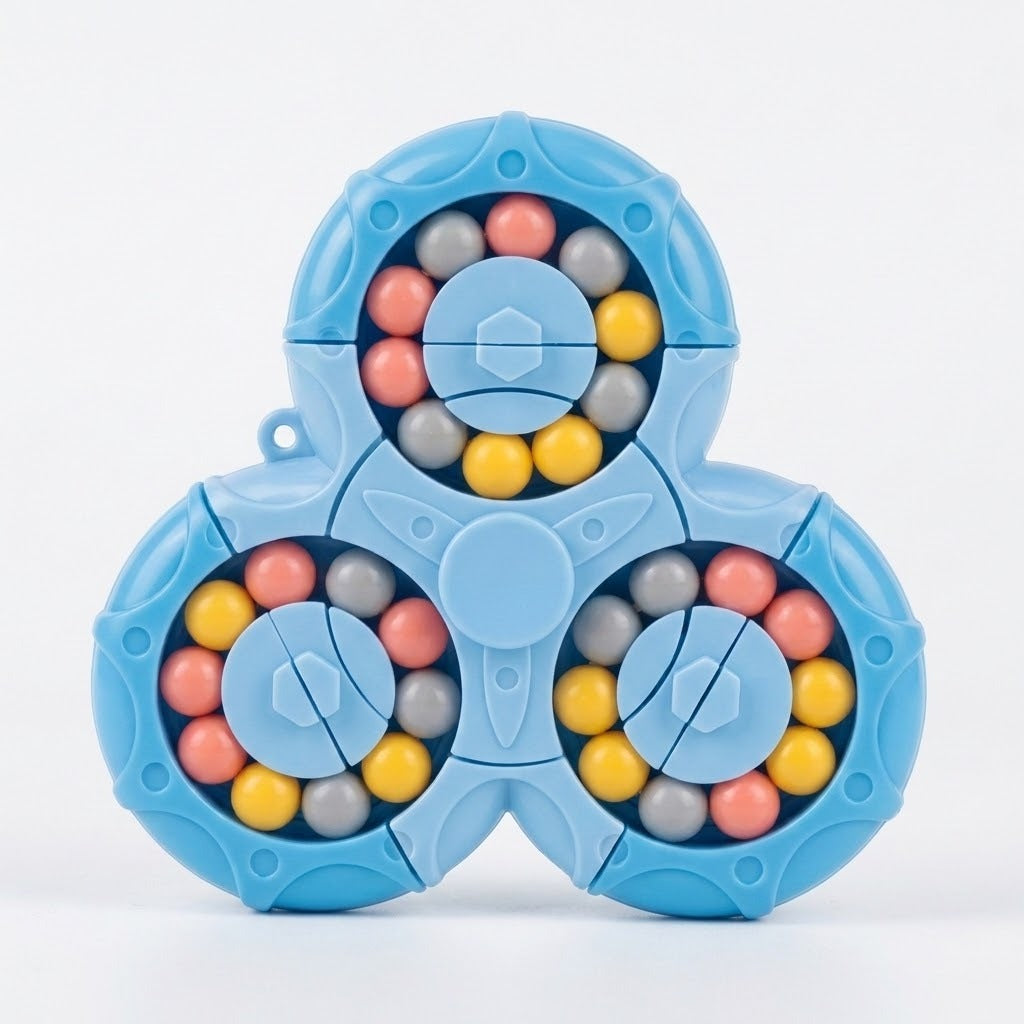 Blue plastic fidget puzzle displays mixed pink, yellow, and gray beads in three circular tracks against a white background.