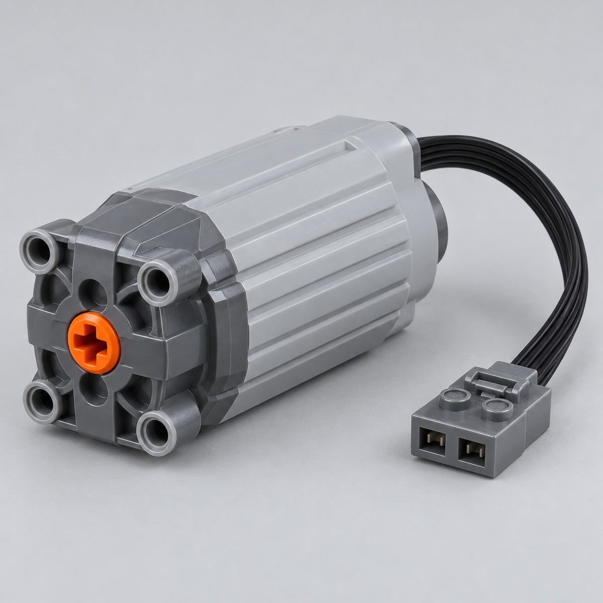 L Motor variant shows its longer gray ribbed housing, orange connector and attached power cable.