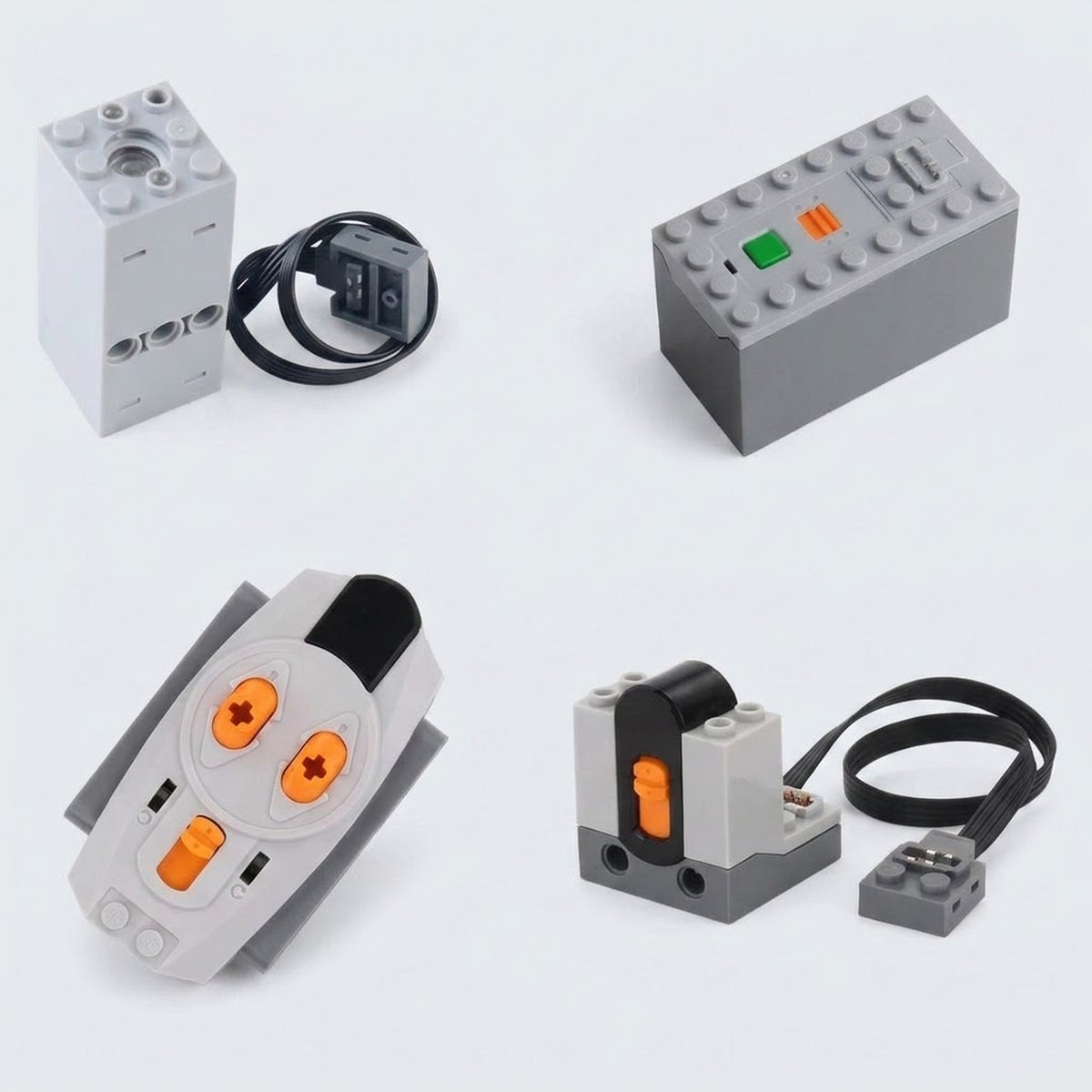 Grey plastic model exhaust sprayer components, remote, and battery case with orange controls and black cables arranged on a white background.