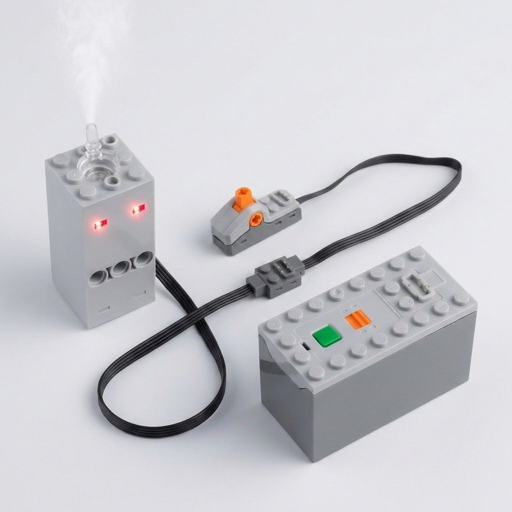 A gray model exhaust sprayer emits mist with two glowing red lights beside a battery case and orange-control switch on white.