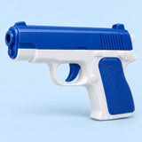 The blue and white water pistol is centered on a pale blue studio background with a light shadow.