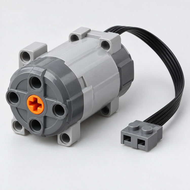 Large building-block motor with cable and connector on a soft gray studio backdrop.