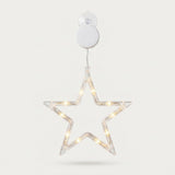 Clear star-shaped window light with warm white LEDs hangs beneath a white battery box and transparent suction cup against a pale background.