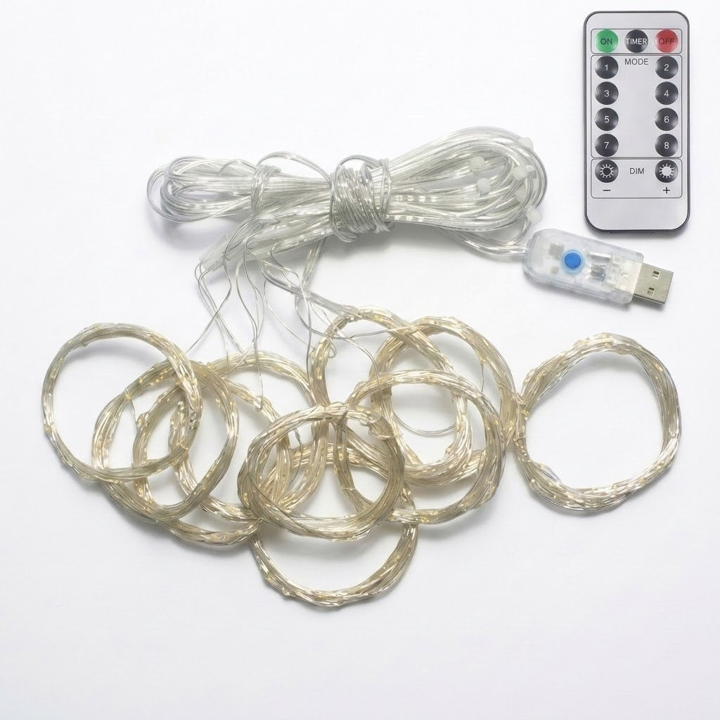 Coiled warm white LED curtain light with clear silver wire strands, a USB plug, and a white remote control on a white background.