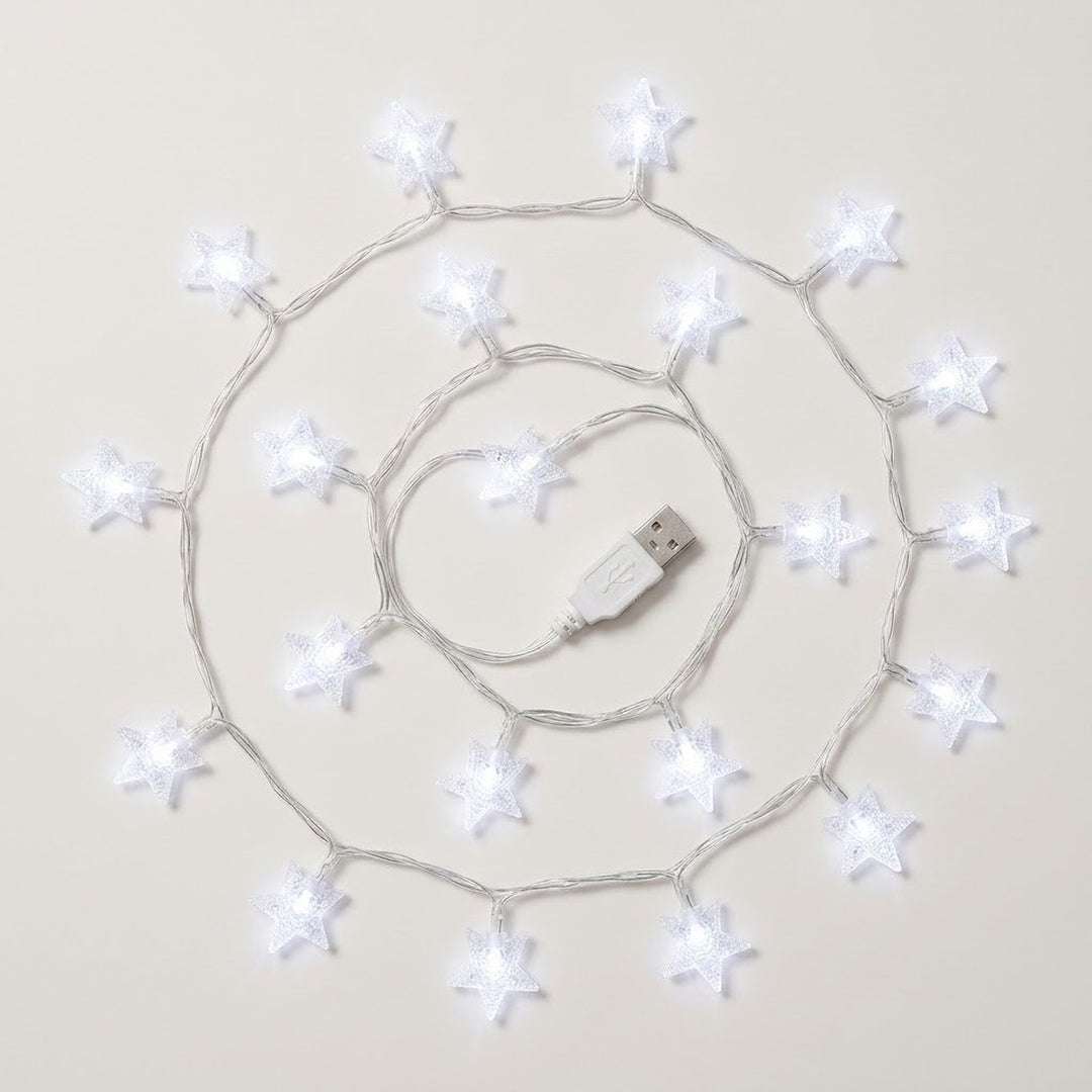 White star-shaped USB string lights arranged in a spiral pattern on a light beige background.