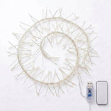 Coiled white LED fairy string lights with a USB connector and a small rectangular remote on a plain white background.
