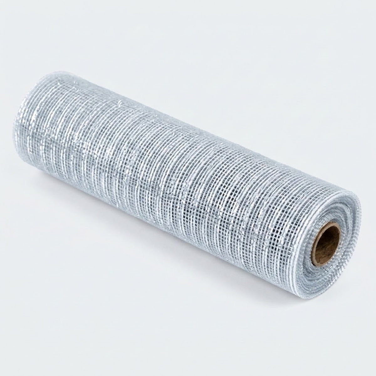 Silver decorative ribbon with an open mesh texture lies rolled diagonally on a pale background, with its brown cardboard core visible.