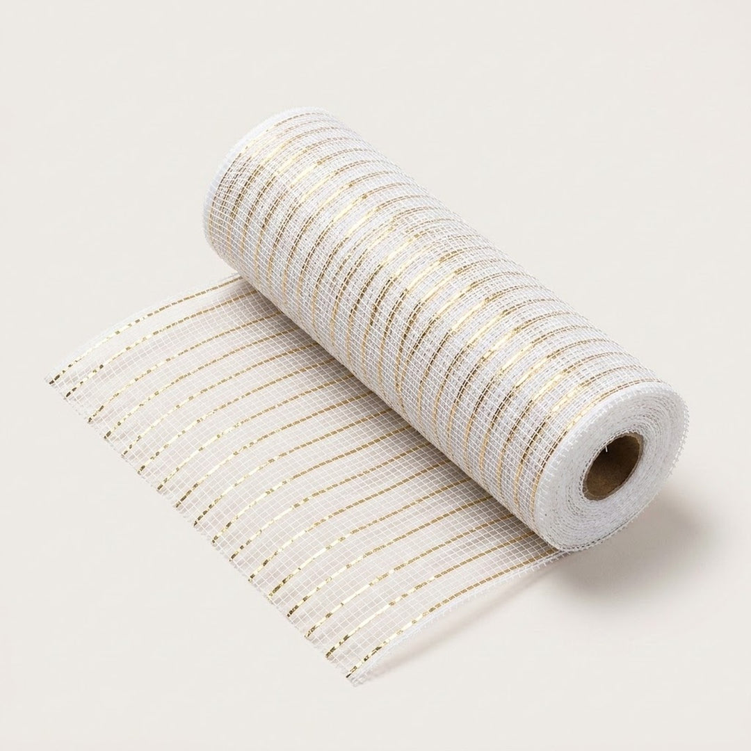 White mesh decorative ribbon with thin gold stripes lies partially unrolled diagonally on a cream background.