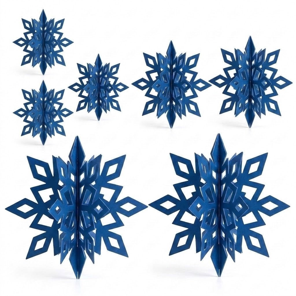 Seven dark blue 3D snowflake ornaments in assorted sizes display geometric cutouts against a white background.