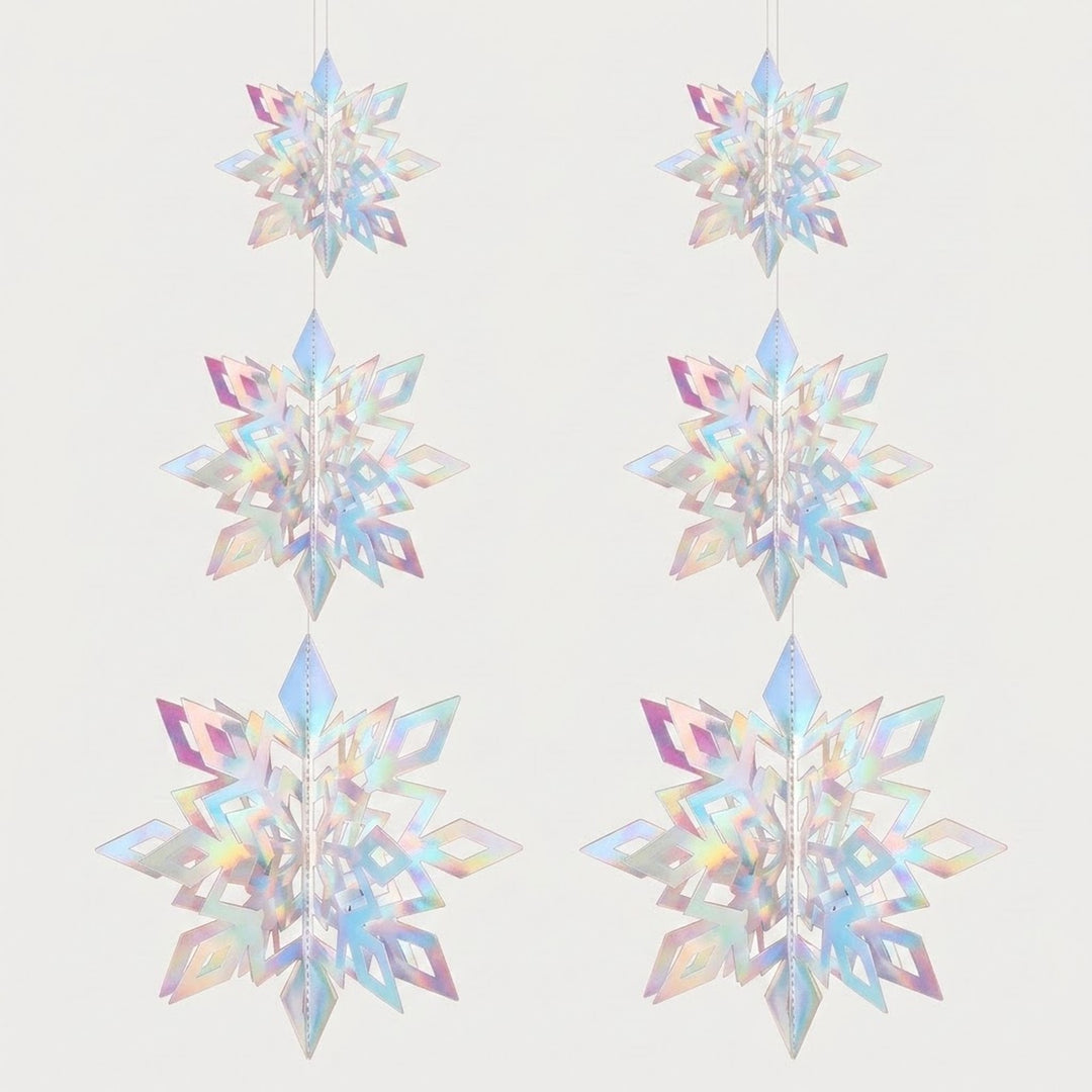 Six iridescent 3D snowflake ornaments with pastel rainbow reflections hang in two columns, increasing in size downward against an off-white background.