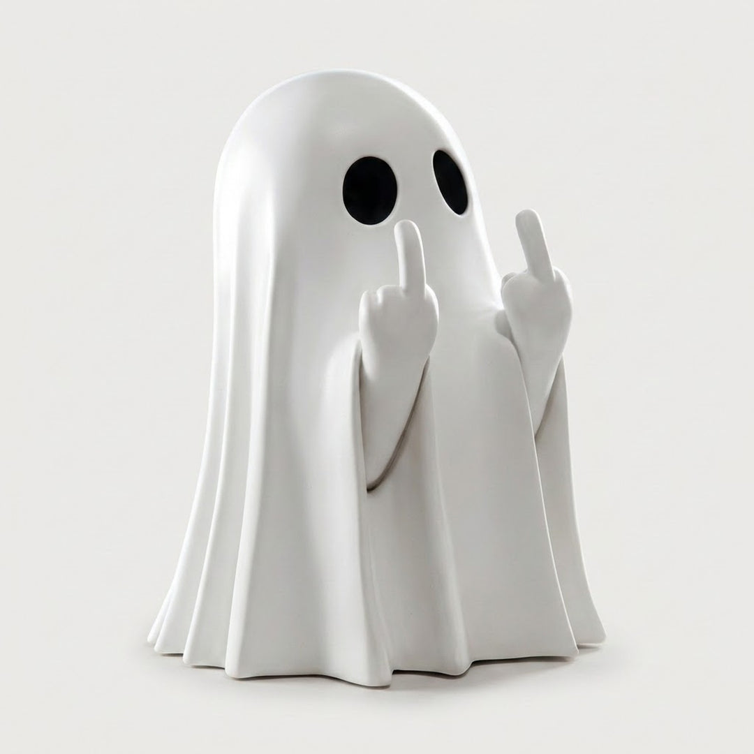 A white ghost figurine with black circular eyes and raised middle fingers, standing on a light gray background.