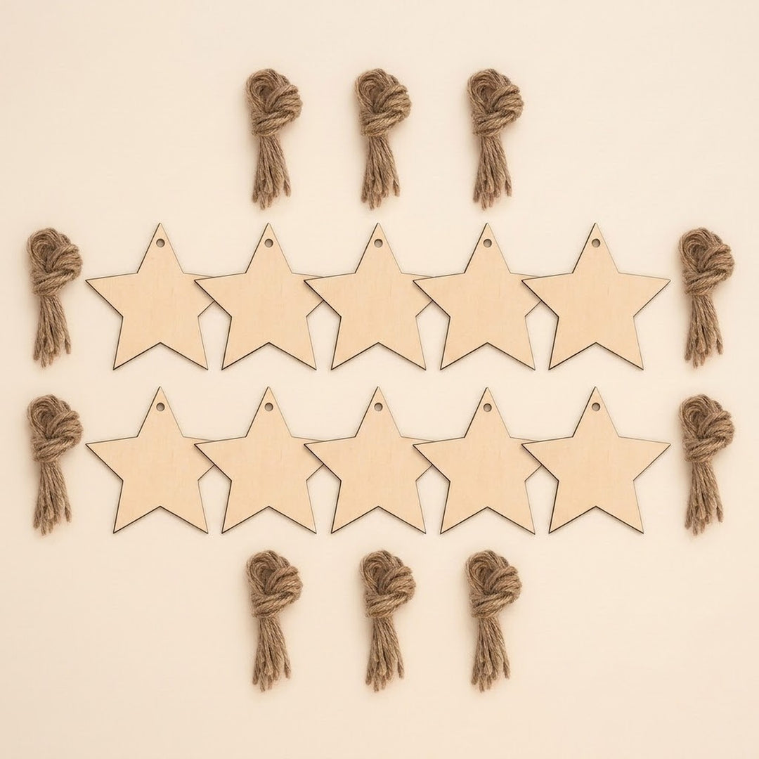 Ten unfinished wood star ornament blanks with hanging holes sit in two rows, surrounded by brown twine bundles on a cream background.