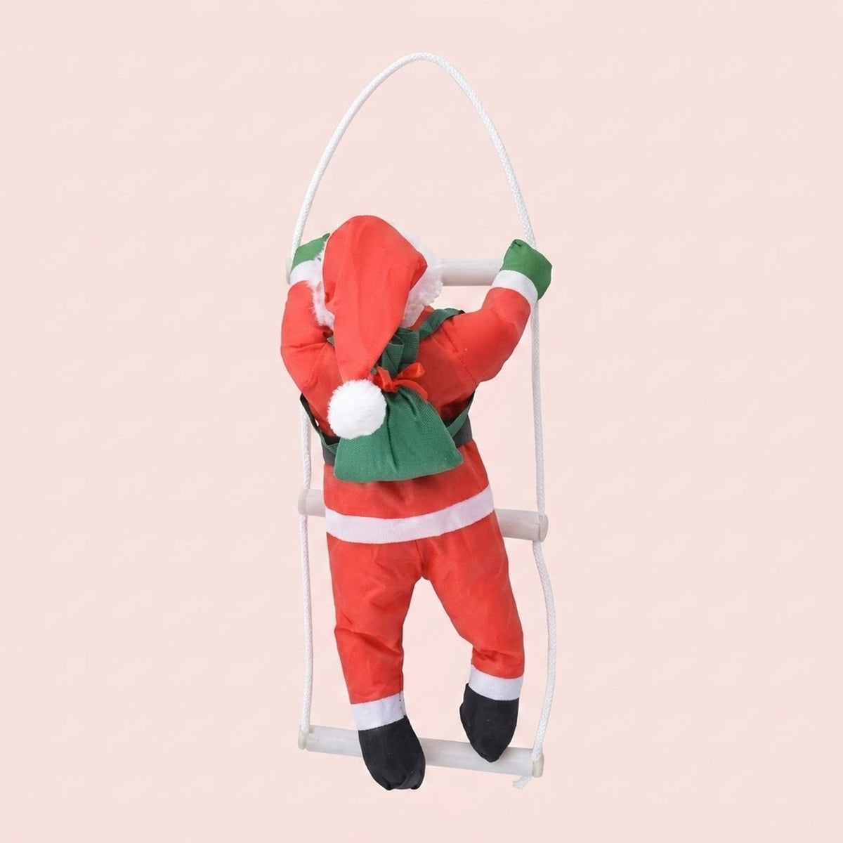 A Christmas-themed hanging decoration shaped like a person in a Santa Claus outfit climbing a white ladder, shown against a solid pale pink background.