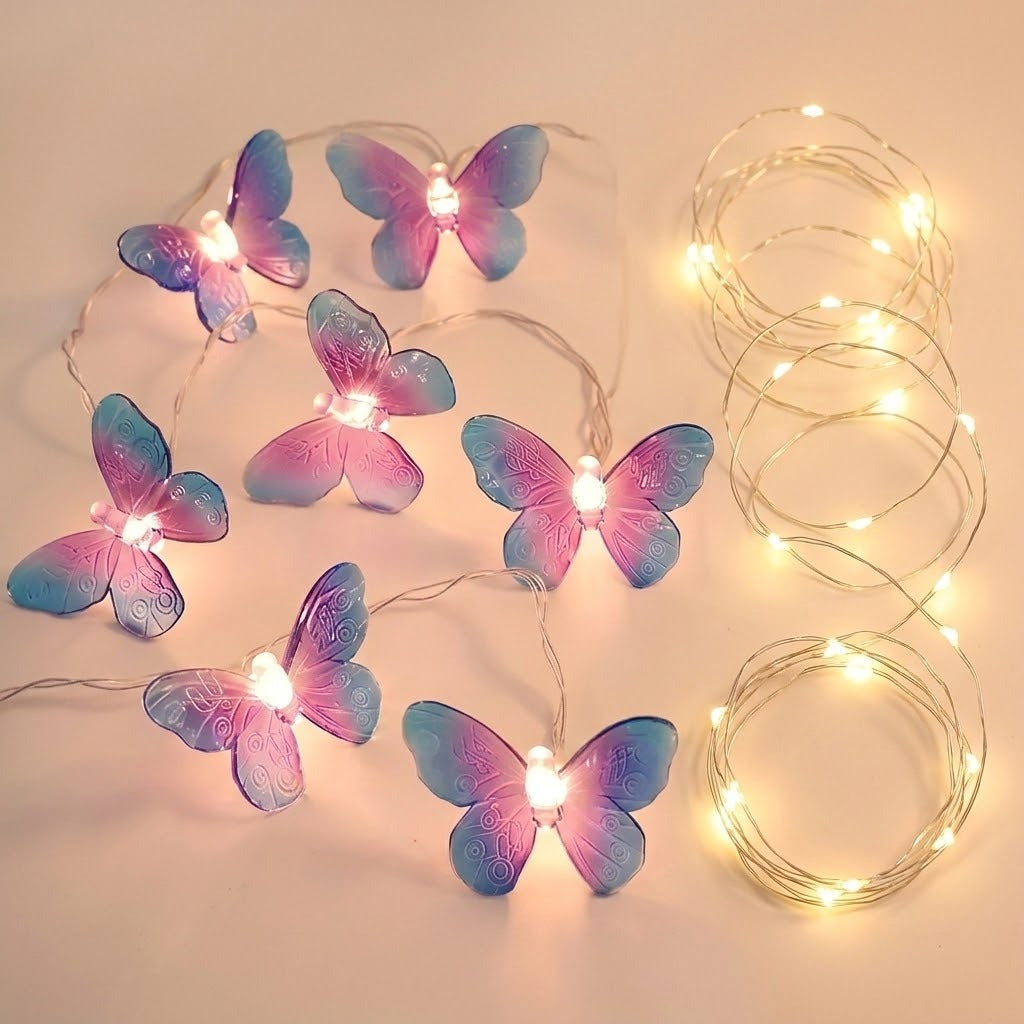 Purple and blue butterfly string lights glow beside coiled warm yellow fairy lights on a pale peach background.
