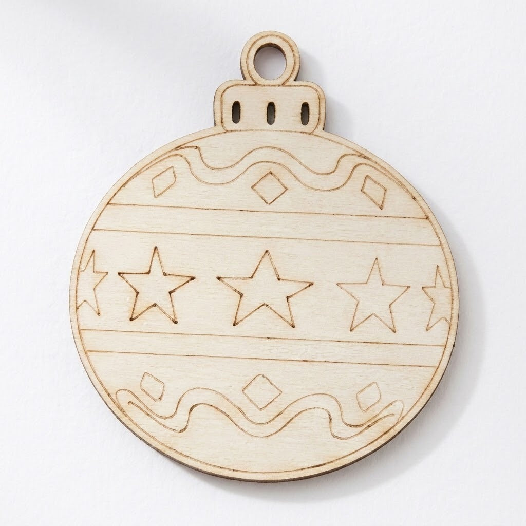 An unfinished wood ornament craft set piece features etched stars, diamonds, wavy lines, and a hanging hole against a white background.