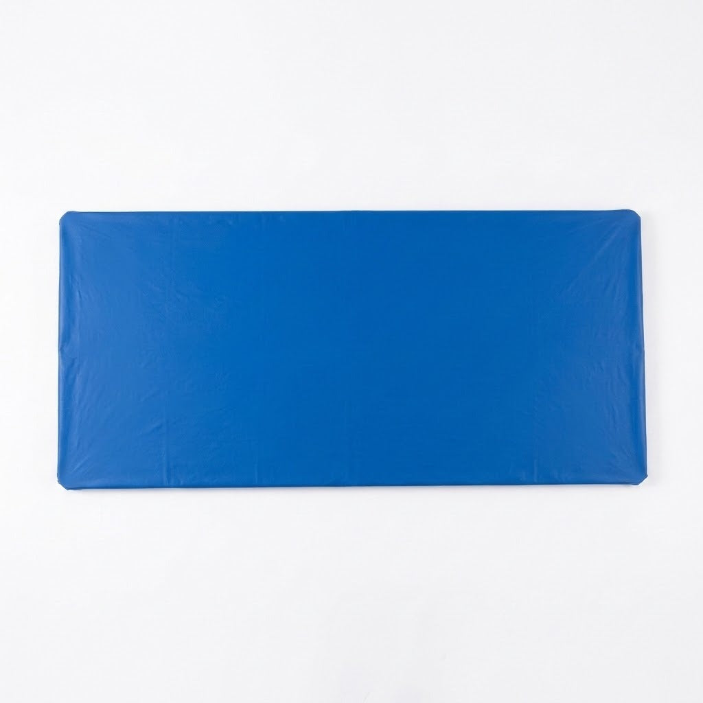 A rectangular blue tablecloth lies flat against a plain white background.