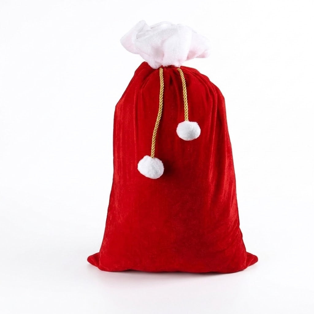 Red gift sack with gathered white trim, gold drawstrings, and two white pom-poms stands against a plain white background.