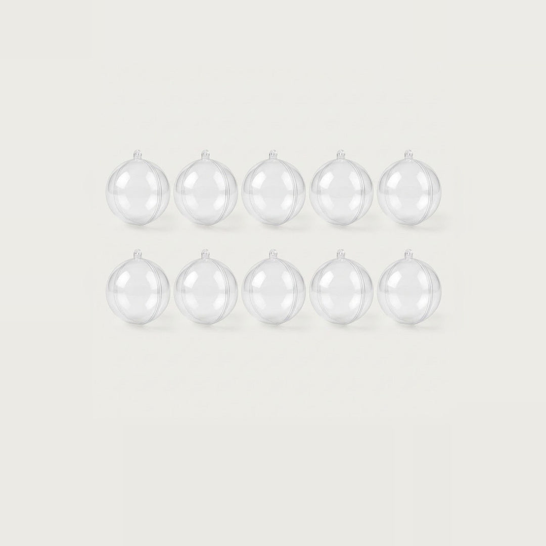 Ten clear plastic fillable ornaments with top hanging loops form two evenly spaced rows of five against an off-white background.