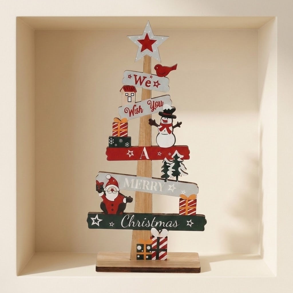 Wooden tabletop Christmas decoration with red, green and white message slats and a star topper stands inside a cream wall niche.