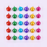 Thirty metallic jingle bells in red, green, blue, purple, gold, and pink form five rows on a pale background.