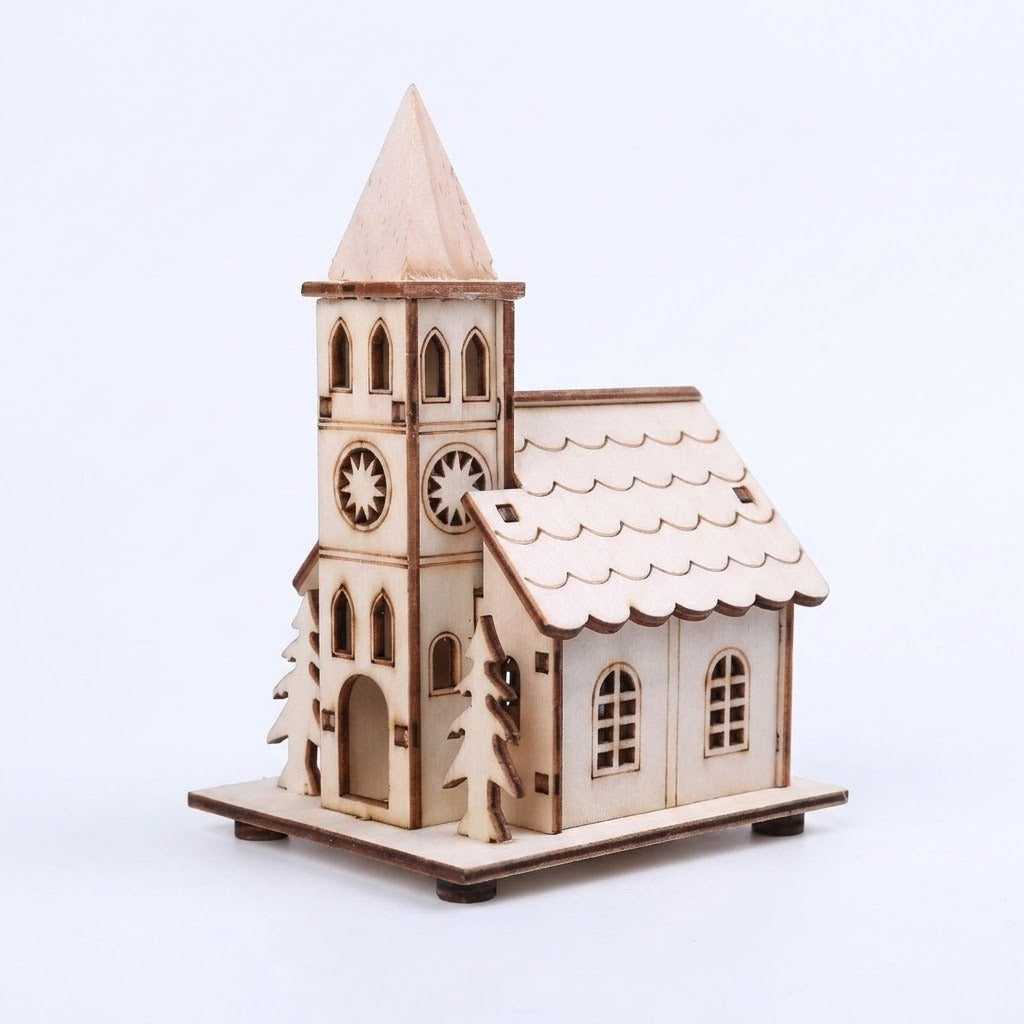 A light wooden Christmas house with a pointed tower, star cutouts, and tree silhouettes stands against a white background.
