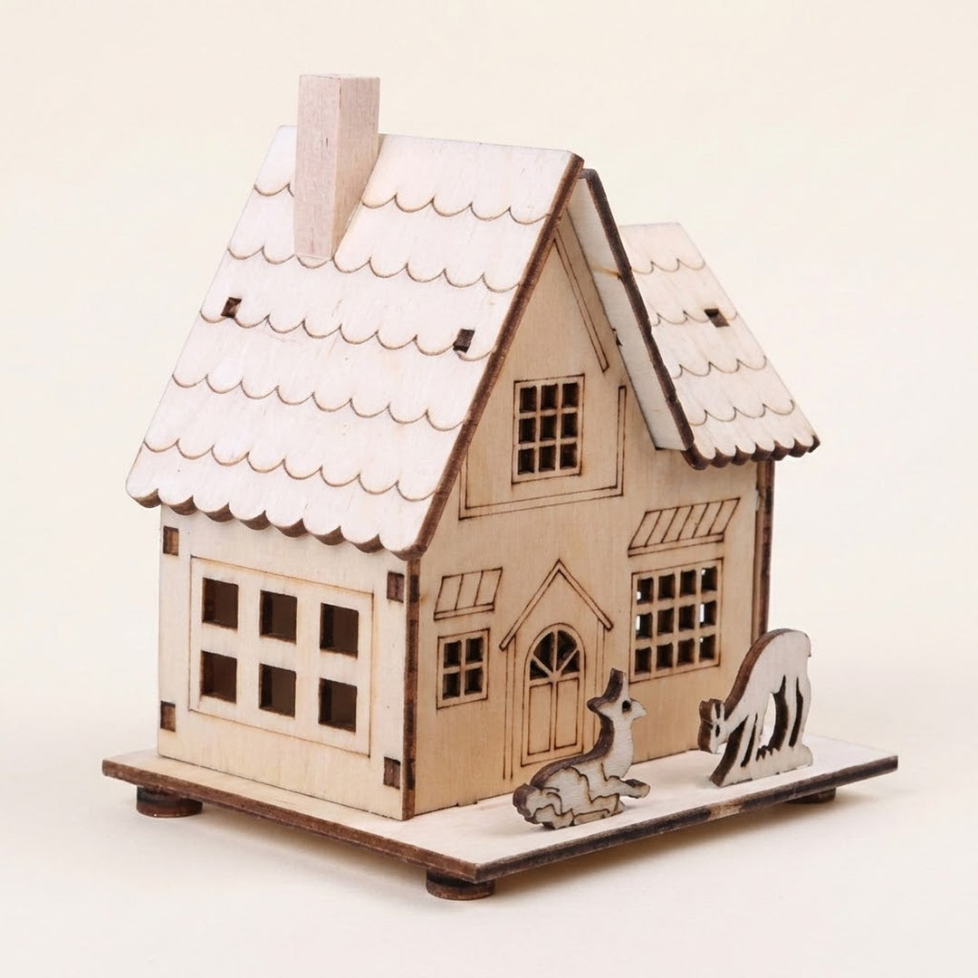 Pale wooden christmas house with a chimney, scalloped roof, cutout windows, and two deer figures on a rectangular base against a cream background.