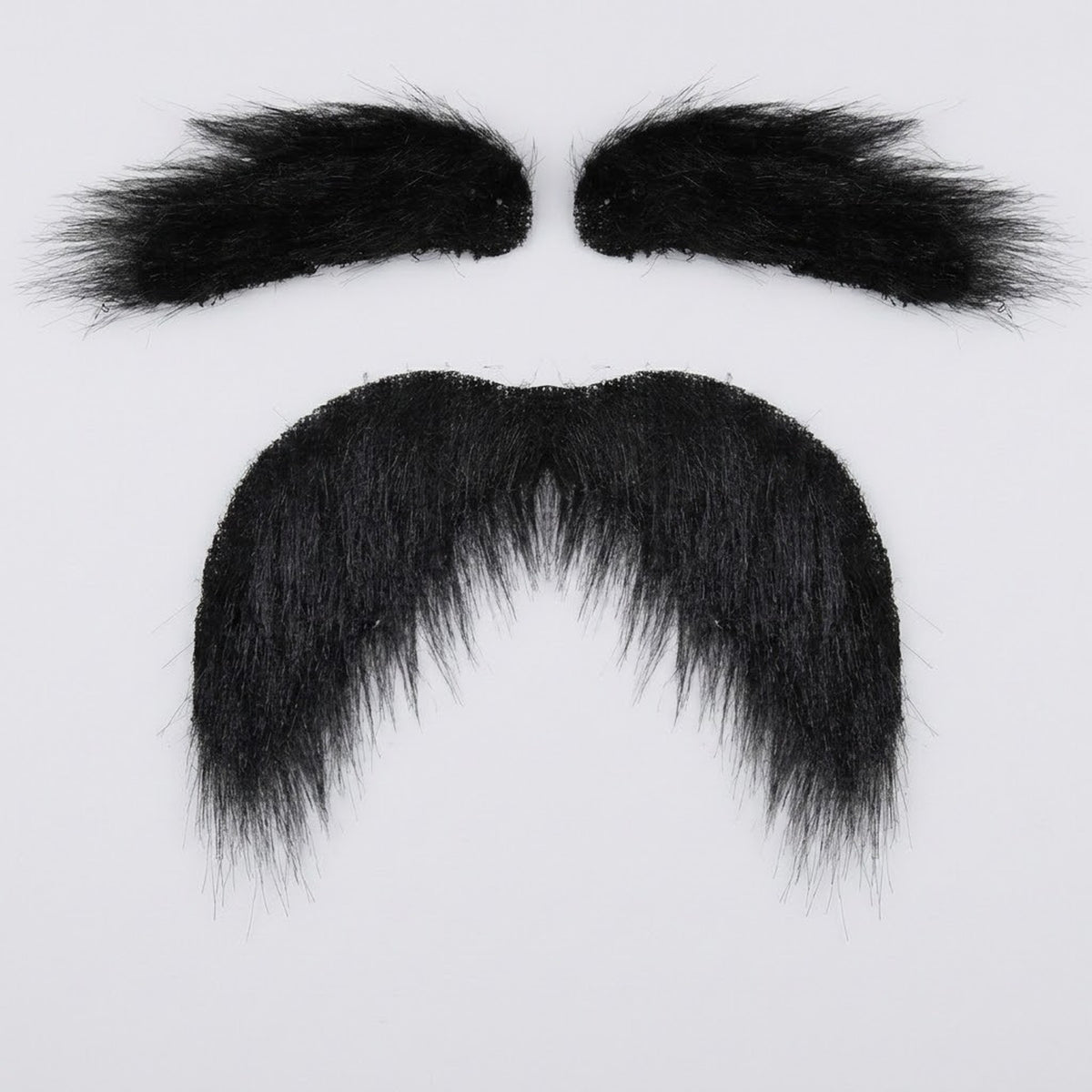 Black costume facial hair features two bushy eyebrows above a thick mustache with drooping ends on a light gray background.