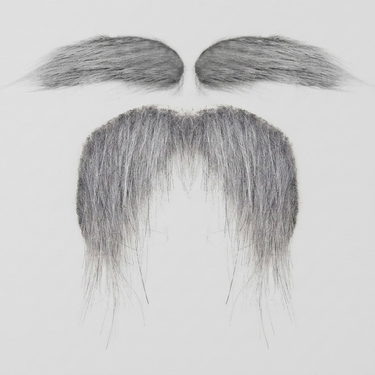 Gray costume facial hair includes two eyebrows above a drooping mustache with long, wispy strands on a light gray background.