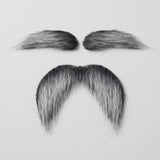 Salt-and-pepper costume facial hair includes two eyebrows and a drooping mustache with black and silver strands on a light gray background.