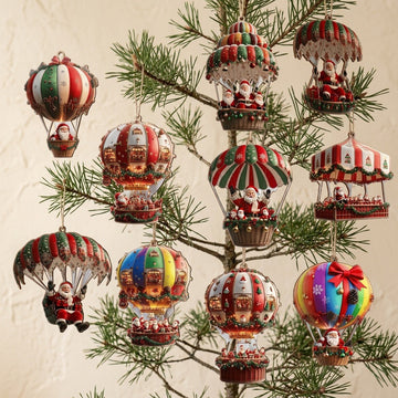 Christmas ornaments with red, green, cream, and rainbow Santa balloon and parachute designs hang from sparse pine branches against beige.