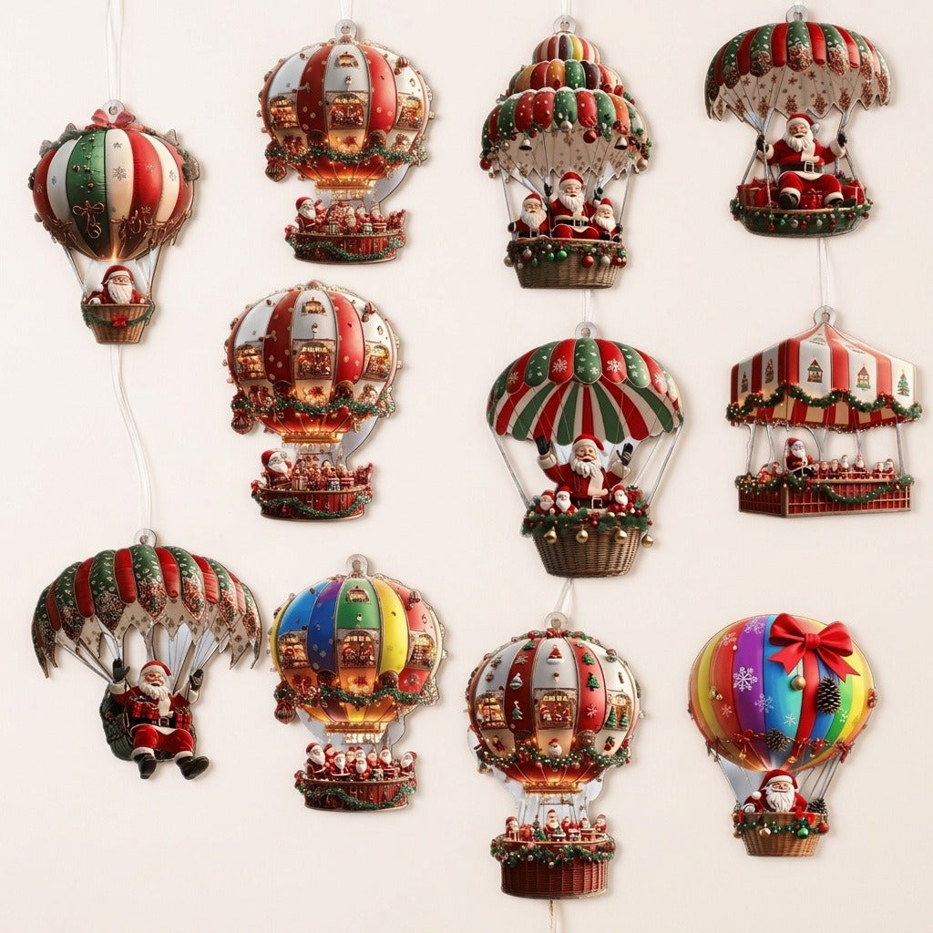 Timber Christmas ornaments depicting Santa parachutes and hot air balloons in red, green, cream, and rainbow colours hang against an off-white background.