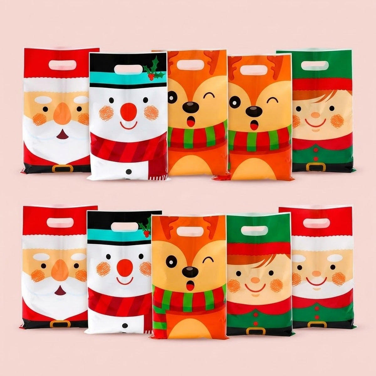 Christmas gift bags with Santa, snowman, orange reindeer, and green elf faces stand in two rows against a pink background.