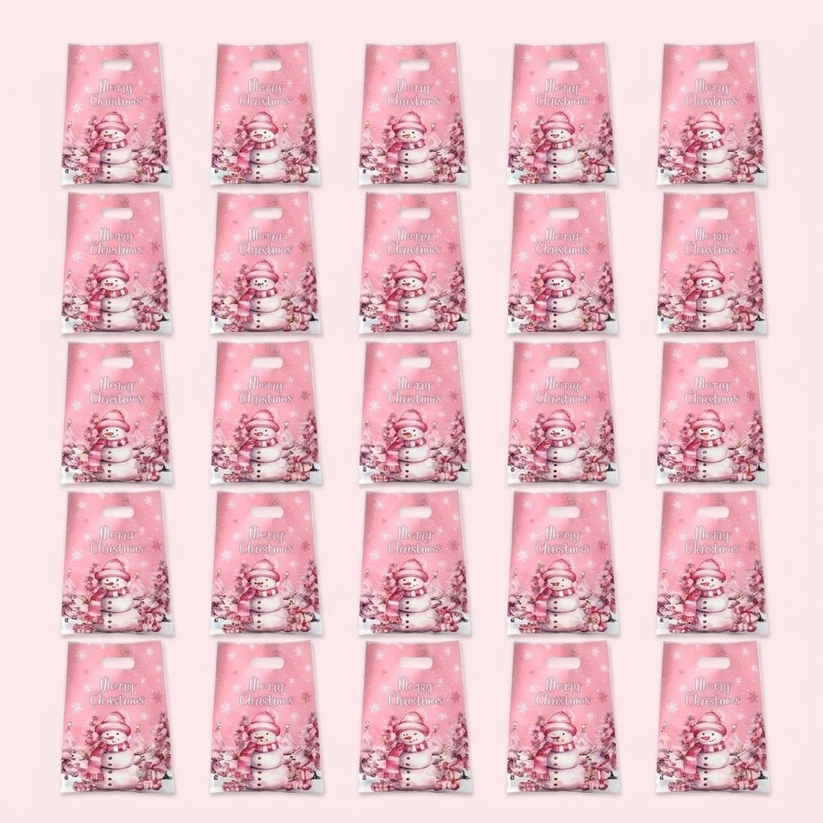 Pink handled gift bags with snowmen, Christmas trees, and Merry Christmas lettering form a five-by-five grid against a pale pink background.