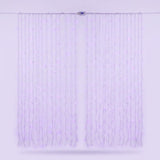 Pale purple curtain lights hang on clear wires against a lavender background, with a small connector along the top cable.