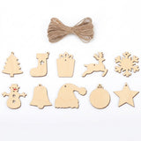 Ten pale wooden ornament blanks in mixed Christmas shapes sit beneath bundled brown twine on a white background.