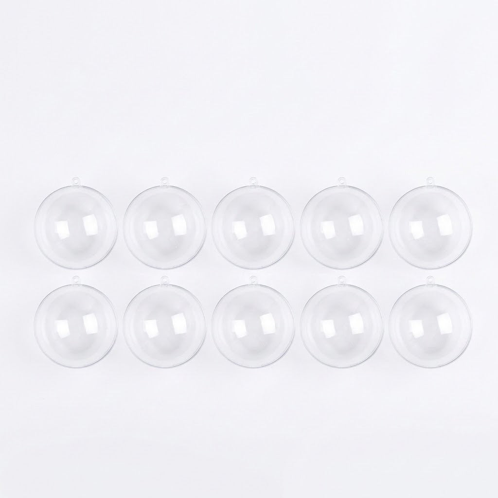 Ten empty clear plastic fillable ornaments with hanging tabs are arranged in two rows of five against a white background.