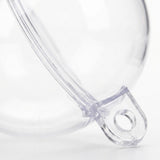A clear plastic fillable ornament appears close up against white, showing its curved joining edge and hanging tab with a circular hole.
