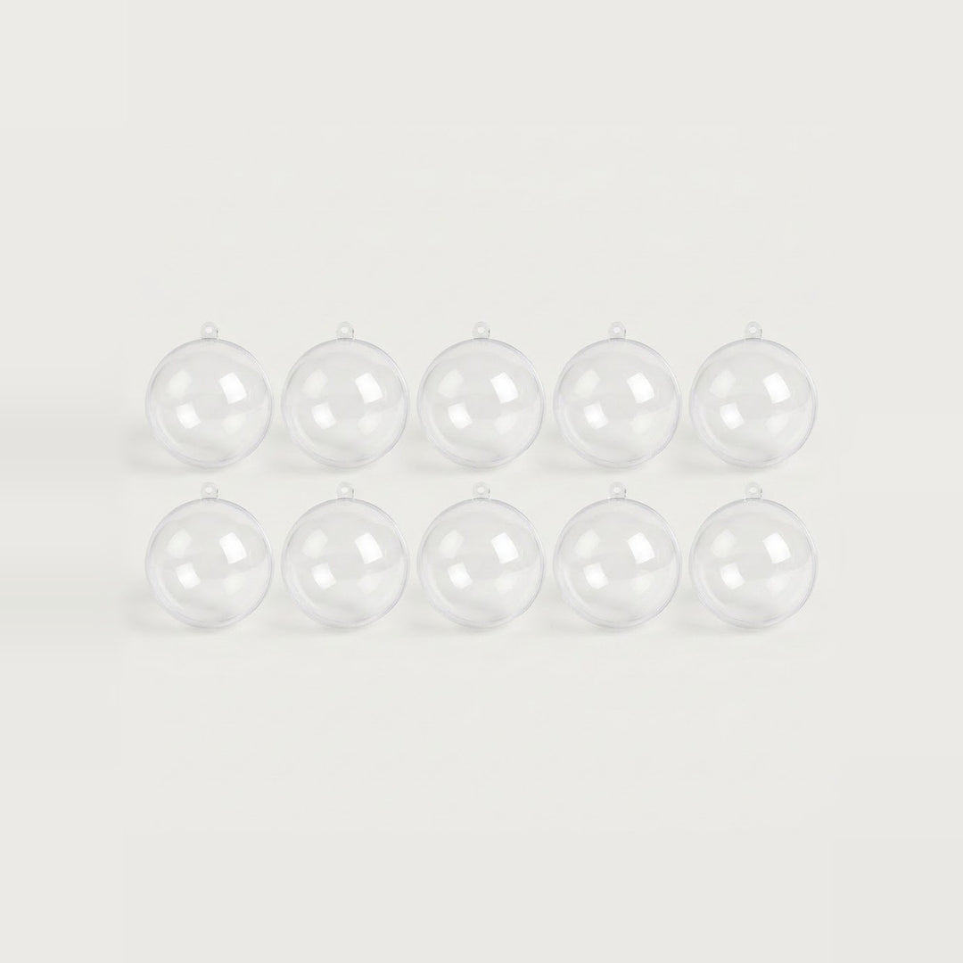 Ten clear plastic fillable ornaments with hanging loops sit in two evenly spaced rows against a white background.